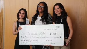ASPPH Innovation Lab Winners smiling and posing with a large check